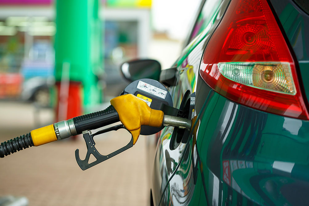 Car refuelling on a petrols station close up