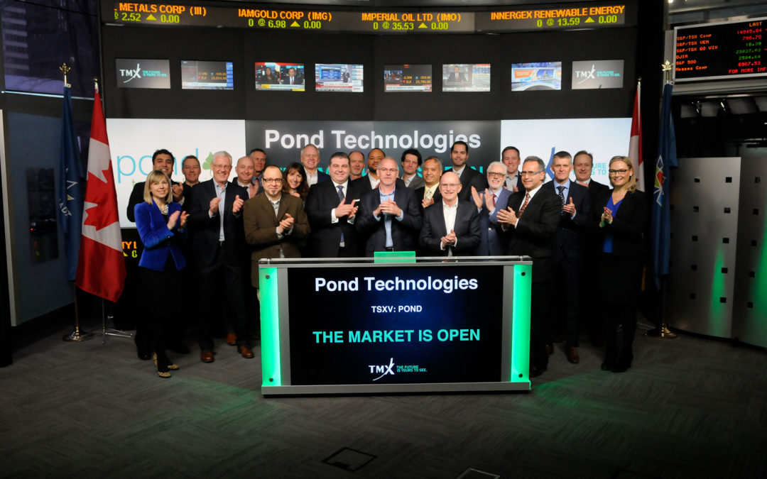 The Pond Tech team celebrating going public on the TSX-Ventures stock market. TSXV: Pond. Pond Technologies ringing the bell, the market is open.